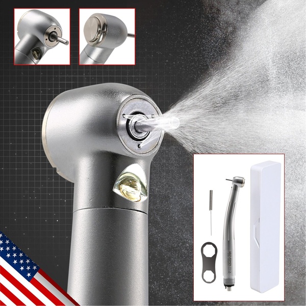 A detailed product display showing the dental handpiece in operation with water spray and a clear look at its accessories and storage case.